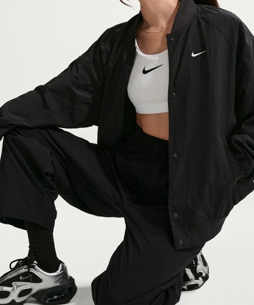 NIKE(ナイキ)の「ナイキ NIKE ナイキ ウィメンズ NSW ハイブリッド ヴァーシティ ジャケット(ブルゾン・レディース・ブラック/ダークグリーン・M/L)」の4枚目の写真