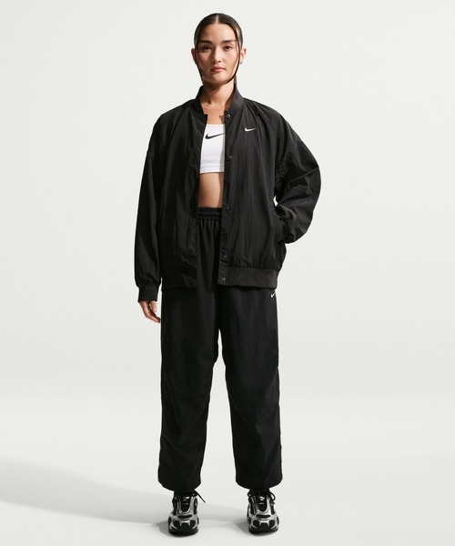NIKE(ナイキ)の「ナイキ NIKE ナイキ ウィメンズ NSW ハイブリッド ヴァーシティ ジャケット(ブルゾン・レディース・ブラック/ダークグリーン・M/L)」の6枚目の写真