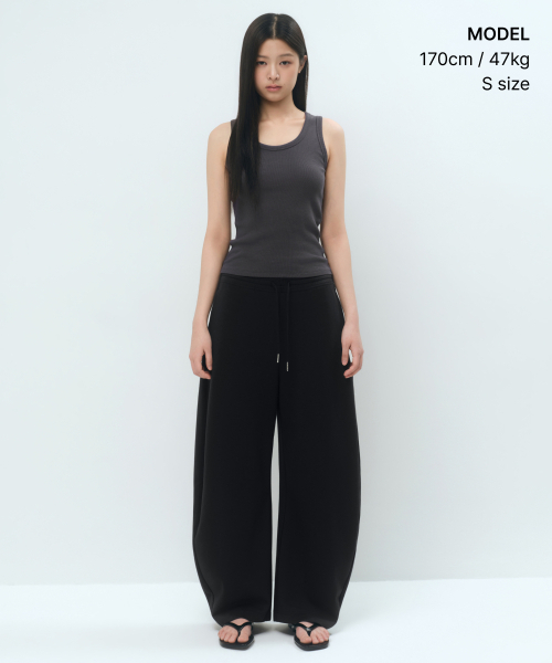 MUSINSA STANDARD WOMAN（ムシンサスタンダードウーマン）の「[クールタンダード] ウィメンズカーブドスウェットパンツ (2色)（スウェットパンツ・レディース・ブラック/グレー・X-SMALL/SMALL/MEDIUM/LARGE）」の5枚目の写真