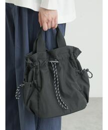 Samansa Mos2（サマンサ モスモス）の「【MOOMIN×SamansaMos2】インナー総柄巾着バッグ（ハンドバッグ）」