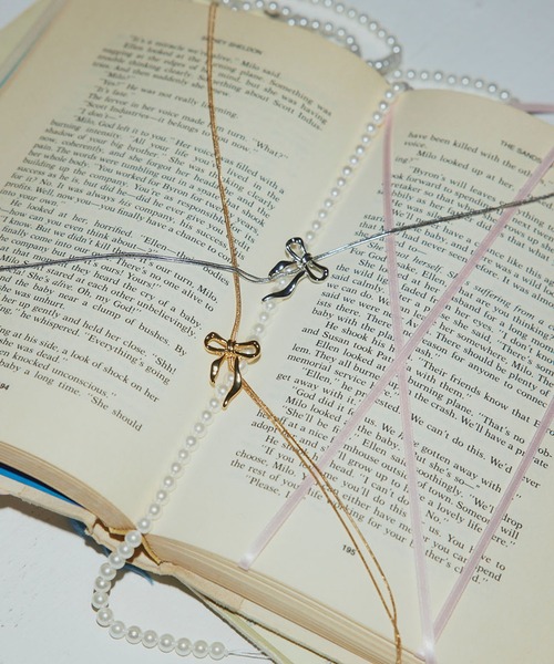 ANU（アヌ）の「lian’s ribbon loop tie - リアンズリボンループタイ（ネックレス・レディース・シルバー/ゴールド・FREE）」の3枚目の写真