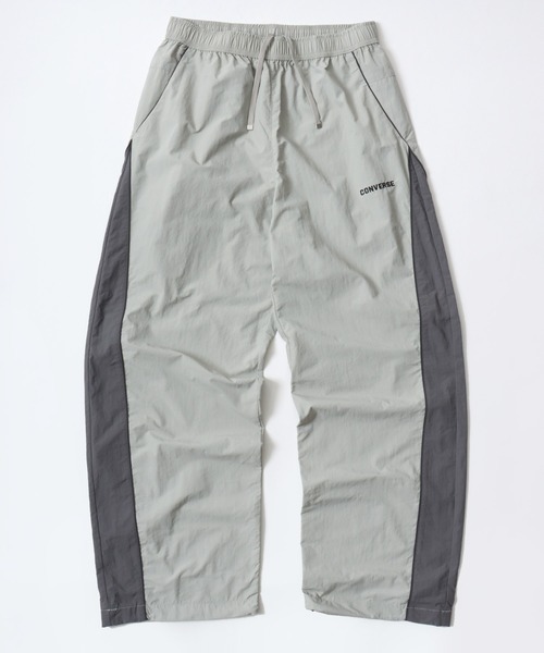 CONVERSE（コンバース）の「CONVERSE/コンバース 撥水 オーバーサイズ パイピング ナイロンパンツ/トラックパンツ/レディース メンズ（その他パンツ・レディース・ブラック/ネイビー/アイボリー・LL/L/M）」の7枚目の写真