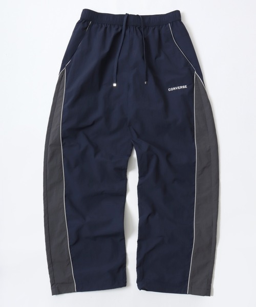CONVERSE（コンバース）の「CONVERSE/コンバース 撥水 オーバーサイズ パイピング ナイロンパンツ/トラックパンツ/レディース メンズ（その他パンツ・レディース・ブラック/ネイビー/アイボリー・LL/L/M）」の11枚目の写真
