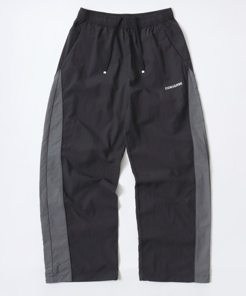 CONVERSE（コンバース）の「CONVERSE/コンバース 撥水 オーバーサイズ パイピング ナイロンパンツ/トラックパンツ/レディース メンズ（その他パンツ・レディース・ブラック/ネイビー/アイボリー・LL/L/M）」の9枚目の写真