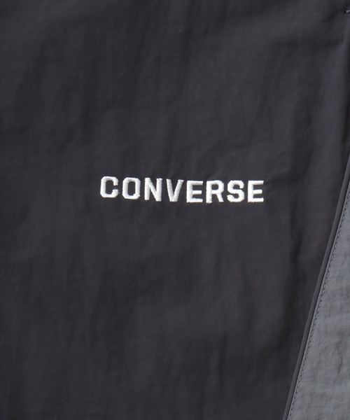 CONVERSE（コンバース）の「CONVERSE/コンバース 撥水 オーバーサイズ パイピング ナイロンパンツ/トラックパンツ/レディース メンズ（その他パンツ・レディース・ブラック/ネイビー/アイボリー・LL/L/M）」の18枚目の写真
