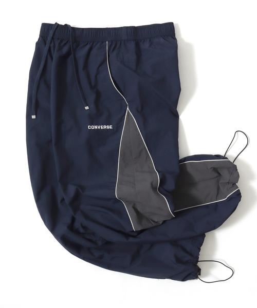 CONVERSE（コンバース）の「CONVERSE/コンバース 撥水 オーバーサイズ パイピング ナイロンパンツ/トラックパンツ/レディース メンズ（その他パンツ・レディース・ブラック/ネイビー/アイボリー・LL/L/M）」の6枚目の写真