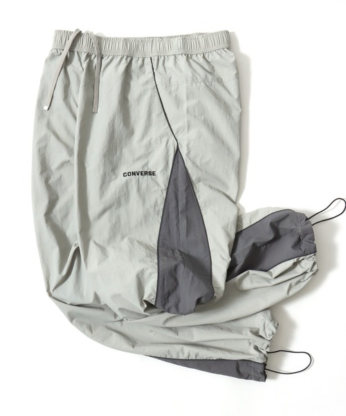 CONVERSE（コンバース）の「CONVERSE/コンバース 撥水 オーバーサイズ パイピング ナイロンパンツ/トラックパンツ/レディース メンズ（その他パンツ・レディース・ブラック/ネイビー/アイボリー・LL/L/M）」の4枚目の写真