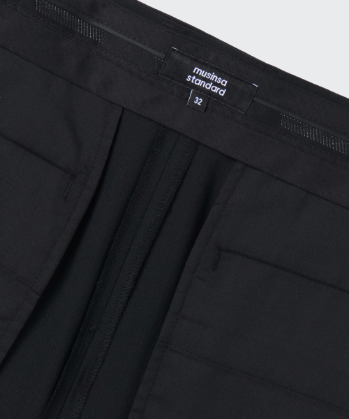 MUSINSA STANDARD（ムシンサスタンダード）の「サマーウールツーピンタックワイドヒドゥンバンディングハーフスラックス[ブラック]（スラックス・メンズ・その他・27/28/29/30/31/32/33/34/36/38）」の4枚目の写真