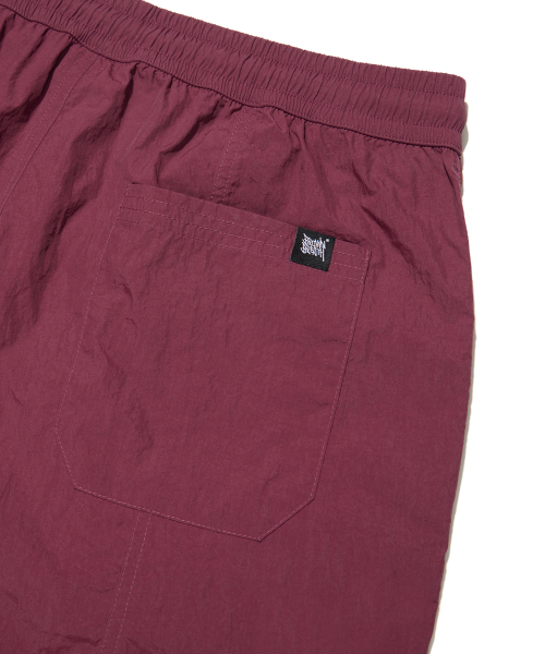 BROWNBREATH(ブラウンブレス)の「TAG NYLON SHORTS - BURGUNDY(その他パンツ・レディース・その他・L/M/S/XL)」の6枚目の写真