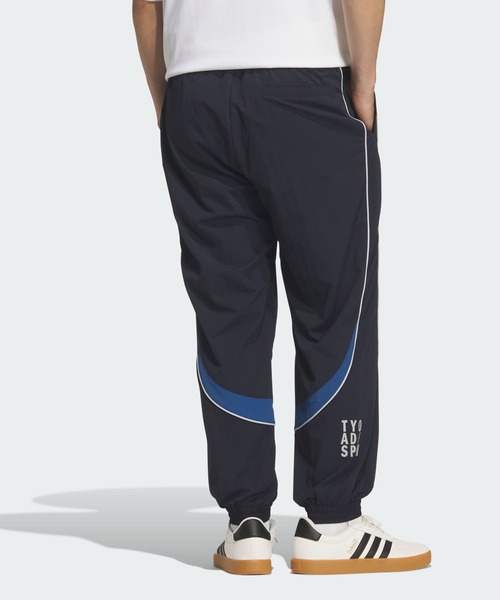 adidas(アディダス)の「ブランドラブ ルーズフィット ライトウーブン フルレングス エラスティックカフ パンツ / アディダス adidas(スウェットパンツ・メンズ・ブルー・LARGE/SMALL/MEDIUM/X-LARGE)」の2枚目の写真