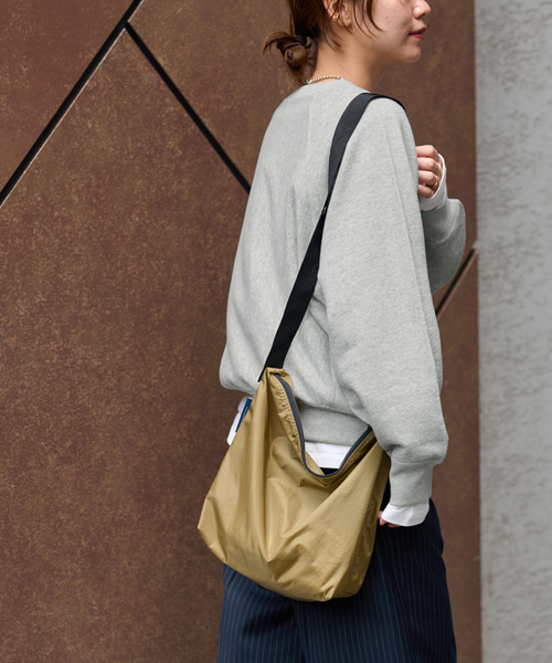 Champion（チャンピオン）の「別注【Champion/チャンピオン】*RE RW10oz RAGLAN CN SWEAT：スウェット（スウェット・レディース・オレンジ/ホワイト×ホワイト/ブラック系その他/グレー・MEDIUM）」の9枚目の写真