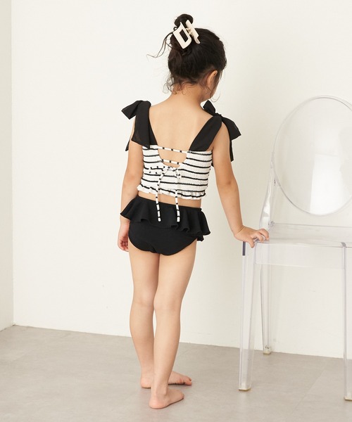 Chico（チコ）の「【WEB限定/水着/ショーツ単品】Kids サイドフリルショーツ（水着・キッズ・ホワイト系その他2/イエロー系その他2/ブラック/ホワイト系その他3・110/130）」の6枚目の写真