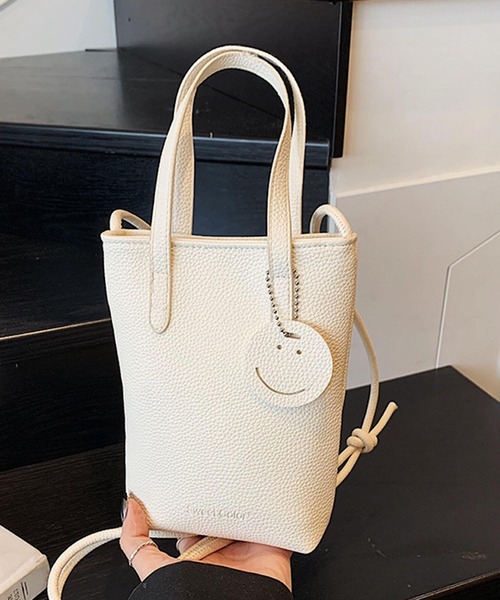 Mignonjour(ミニョンジュール)の「Mignonjour/スマイルチャーム ミニショルダーバッグ M2948(ショルダーバッグ・レディース・ホワイト/イエロー/ブルー・FREE)」の1枚目の写真