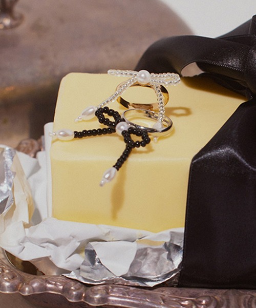 ANU（アヌ）の「ribbon beads ring - リボンビーズリング（リング・レディース・ブラック/ホワイト・FREE）」の11枚目の写真