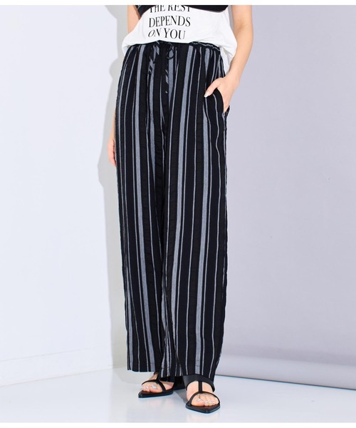 Settimissimo（セッティミッシモ）の「マルチストライプルーズパンツ（スラックス・レディース・アイボリー/ブラック・FREE）」の2枚目の写真