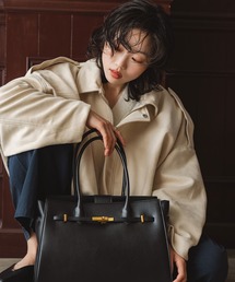 INOIE（イノイエ）の「[INOIE]丸みのあるシルエットが魅力のショート丈アウター（ノーカラージャケット）」