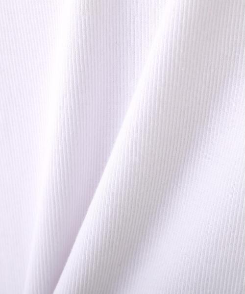 AVIREX(アヴィレックス)の「《DAILY/WOMAN》L/S HENLEY NECK T-SHIRT(Tシャツ/カットソー・レディース・ホワイト/ブラック・M/S)」の9枚目の写真