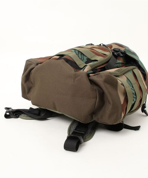 go slow caravan(ゴースローキャラバン)の「MORN CREATIONS/モーンクリエーションズ ティラノサウルスバックパックCAMO 12L(バックパック/リュック・キッズ・カモフラージュ・FREE)」の3枚目の写真