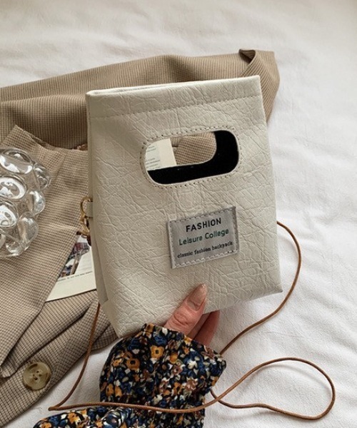 SEN TOKYO（セントーキョー）の「スタイリングのワンポイントに。ロゴタグ付きミニバック（ハンドバッグ・レディース・ホワイト/ブラック/ブラウン・FREE）」の5枚目の写真