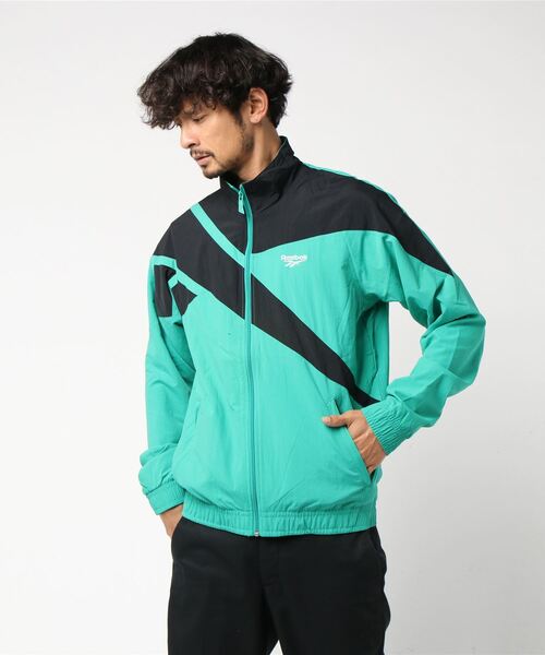 Reebok�i���[�{�b�N�j�́u�N���V�b�N�X �x�N�^�[ �g���b�N�W���P�b�g�mClassics Vector Track Jacket�n���[�{�b�N�i�i�C�����W���P�b�g�j�v�b�G�������h