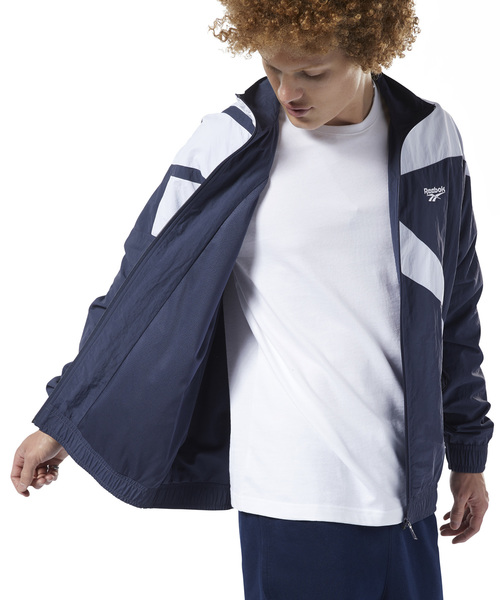 Reebok（リーボック）の「クラシックス ベクター トラックジャケット / Classics Vector Track Jacket（ナイロンジャケット・メンズ・グリーン/エメラルド/イエロー×ブラック/ブラック×ホワイト/ネイビー×ホワイト/ネイビー/ホワイト・SMALL/MEDIUM/LARGE/X-LARGE/XX-LARGE/XXX-LARGE/X-SMALL）」の19枚目の写真