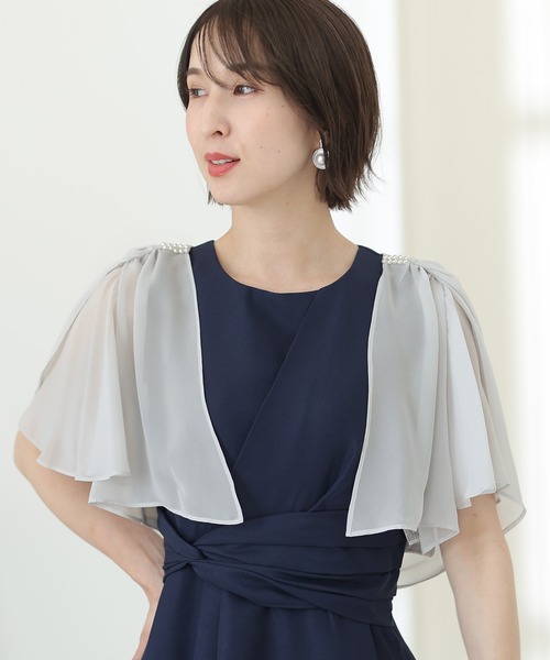 PourVous(プールヴー)の「リボンが心揺らめくリボン ボレロ 結婚式対応 オケージョン (ノーカラージャケット・レディース・アイボリー/ブラック/シルバー/ネイビー・M)」の1枚目の写真