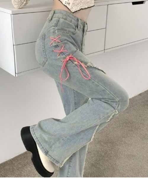 NANEA(ナネア)の「サイドレースアップ&フリンジデザイン デニムフレアパンツ(デニムパンツ・レディース・ブルー・SMALL/MEDIUM/LARGE)」の1枚目の写真