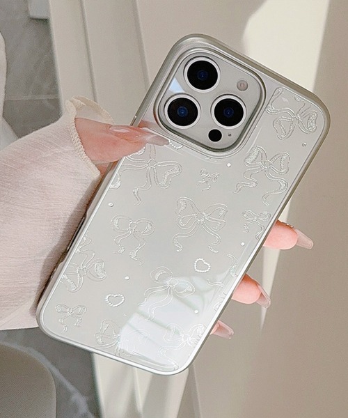 Vini(ヴィニ)の「きらめき シルバー リボン iPhone ケース 13/14.15.16.16Pro(スマホケース/カバー・レディース・ホワイト×シルバー・iPhone 16 Pro/iPhone 16/iPhone 15/iPhone 13/14/iPhone 17 Pro/iPhone 17)」の8枚目の写真