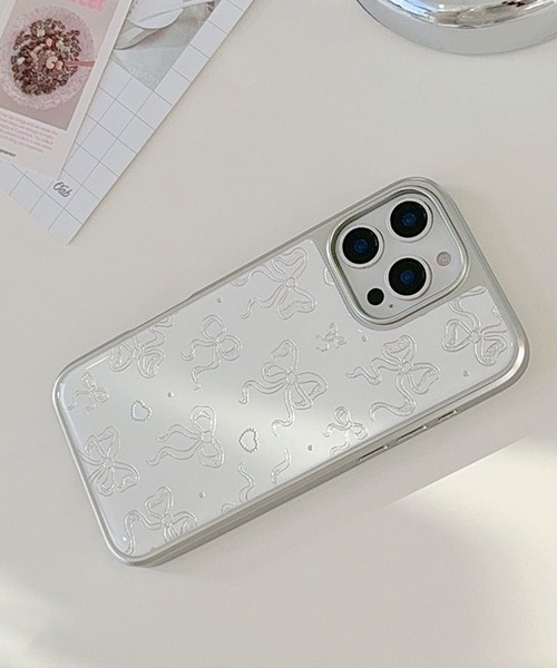 Vini(ヴィニ)の「きらめき シルバー リボン iPhone ケース 13/14.15.16.16Pro(スマホケース/カバー・レディース・ホワイト×シルバー・iPhone 16 Pro/iPhone 16/iPhone 15/iPhone 13/14/iPhone 17 Pro/iPhone 17)」の10枚目の写真