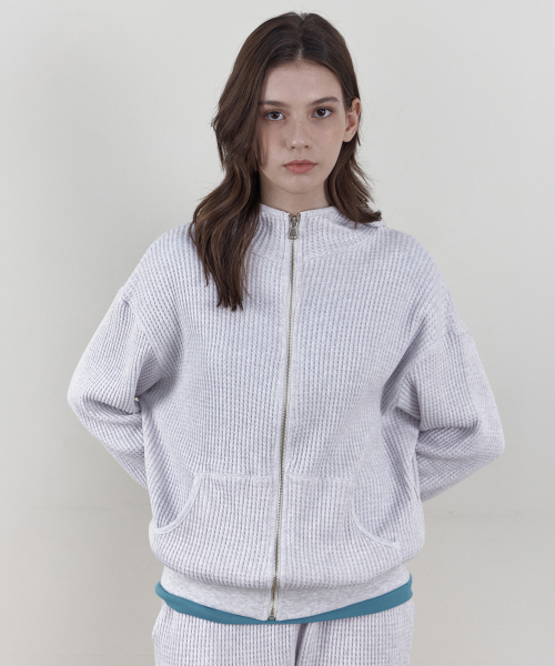 WEDNESDAYOASISFORWOMEN(ウェンズデー オアシス フォー ウーマン)の「ワッフルハイネックフードジップアップ_WHITE MELANGE(WB6OT14)(パーカー・レディース・ホワイト×グレー・FREE)」の2枚目の写真