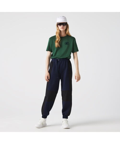 LACOSTE（ラコステ）の「切り替えワイドトラックパンツ（その他パンツ・レディース・オフホワイト/ネイビー・36/34/40/38）」の2枚目の写真