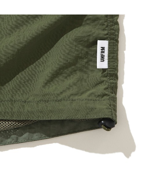 UNFRM OUTDOOR STANDARD(ユニフォームアウトドアスタンダード)の「UNFRM OUTDOOR STANDARD PACKABLE RIPSTOP STAND COLLAR VEST (ユニフォーム アウトドアスタンダード パッカブル リップストップ スタンドカラーベスト)(ベスト・メンズ・オリーブ・LARGE/X-LARGE/MEDIUM)」の6枚目の写真