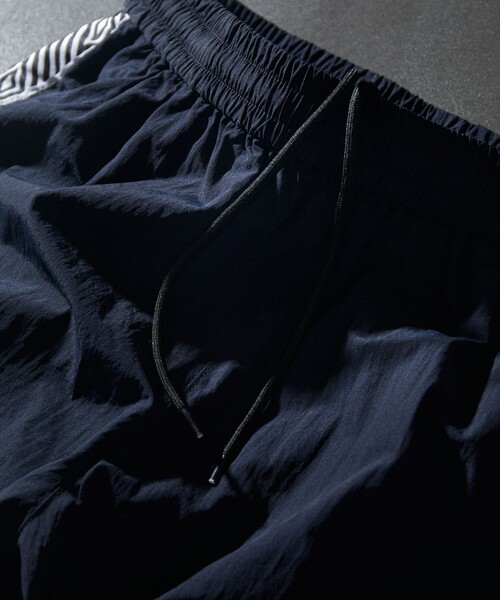 UMBRO（アンブロ）の「UMBRO/アンブロ 別注 Nylon Pant/ナイロン パンツ（その他パンツ・メンズ・ブラック/ネイビー・MEDIUM/LARGE/X-LARGE）」の12枚目の写真