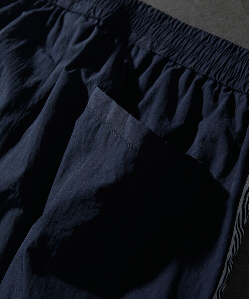UMBRO（アンブロ）の「UMBRO/アンブロ 別注 Nylon Pant/ナイロン パンツ（その他パンツ・メンズ・ブラック/ネイビー・MEDIUM/LARGE/X-LARGE）」の5枚目の写真