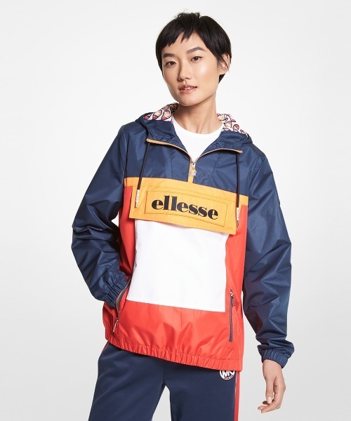 MICHAEL KORS（マイケルコース）の「MK x ellesse ハーフジップ 