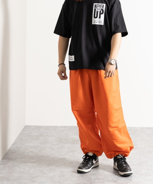 NYLAUS（ナイラス）の「別注 ルーズ スノー パンツ（チノパンツ・メンズ・ホワイト/ブラック/レッド/イエロー/オレンジ/グリーン・LL/L/M）」の13枚目の写真