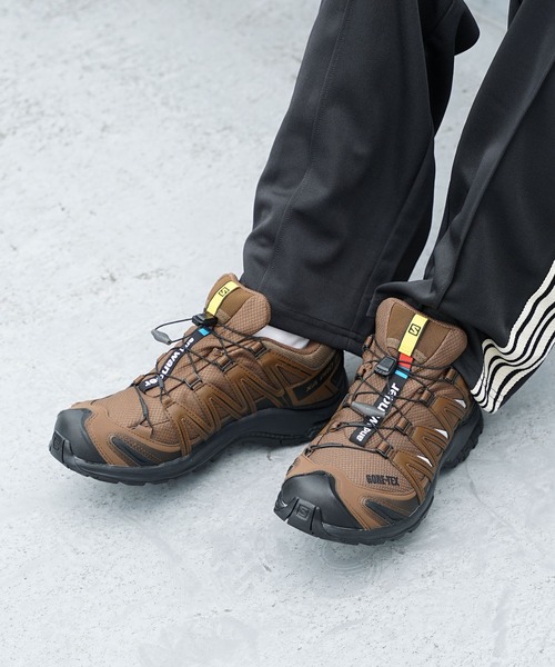 and wander（アンドワンダー）の「and wander/アンドワンダー×SALOMON