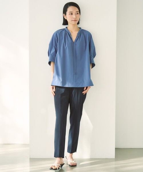 UNFILO(アンフィーロ)の「FINE MOVE テーパードパンツ(その他パンツ・レディース・カーキ系/グレー系/ブラック系/ライトイエロー系/ベージュ系/オレンジ系/ネイビー系/こしょう色系/ダルブルー系/ワイン系・X-SMALL/SMALL/LARGE/MEDIUM)」の5枚目の写真