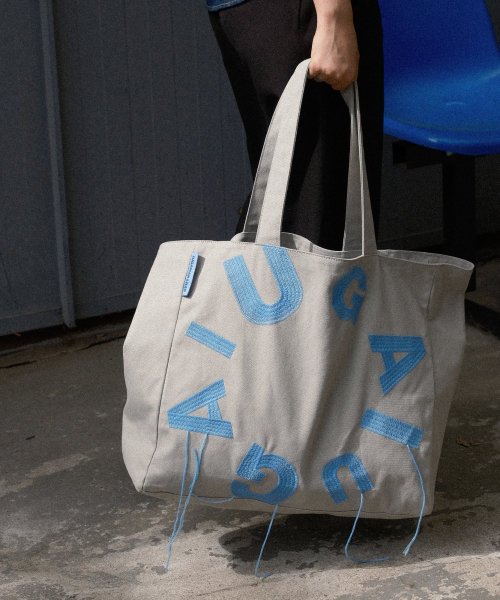 IUGAMAKARAS（イウガマカラス）の「IUGA Big Shopper Bag (Gray)（エコバッグ/サブバッグ・レディース・その他・FREE）」の2枚目の写真