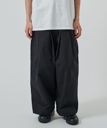 SHINYAKOZUKA(VRdJ)́ySHINYAKOZUKAzʒ UPCYCLED BAGGY(`mpc)