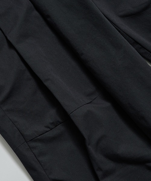 SHINYAKOZUKA（シンヤコヅカ）の「【SHINYAKOZUKA】別注 UPCYCLED BAGGY（チノパンツ・メンズ・ダークグリーン/ブラック・S/M）」の10枚目の写真