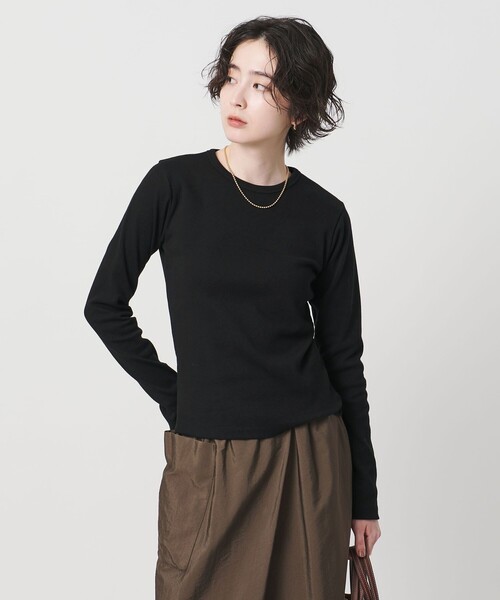 UNITED ARROWS(ユナイテッドアローズ)の「コットン フライス ロング カットソー(Tシャツ/カットソー・レディース・ブラック/ホワイト・FREE)」の1枚目の写真