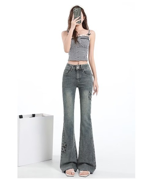 SALTMINT(ソルトミント)の「サイドリボンフレアデニムパンツ(デニムパンツ・レディース・ブルー・XS/S/M/L)」の5枚目の写真