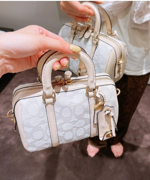 りいさ COACH（コーチ）の「ルビー サッチェル 18 シグネチャー