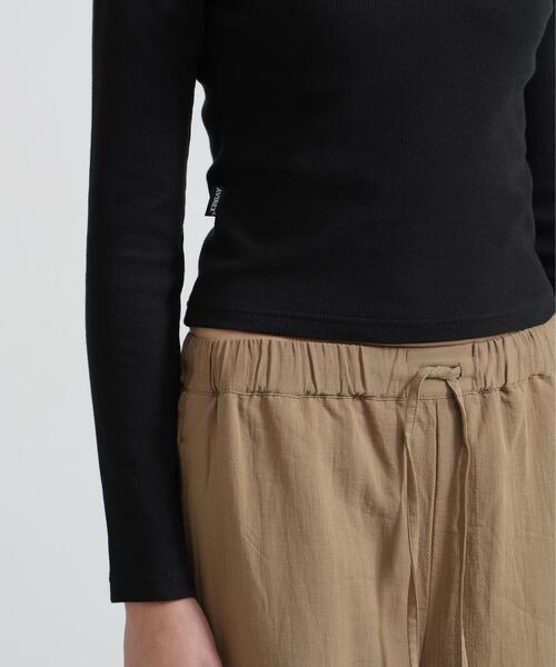AVIREX(アヴィレックス)の「《DAILY/WOMAN》L/S CREW NECK T-SHIRT(Tシャツ/カットソー・レディース・ブラック/ホワイト・M/S)」の11枚目の写真