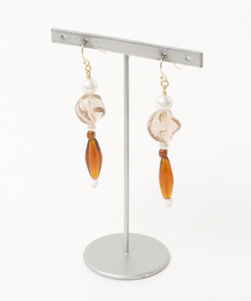 TONE SELECT GOODS(トーンセレクトグッズ)の「【tschuss(チュース)】cirque d'hiver (冬のサーカス) ピアス(ピアス(両耳用)・レディース・ブラウン/イエロー/レッド/クリア・FREE)」の1枚目の写真