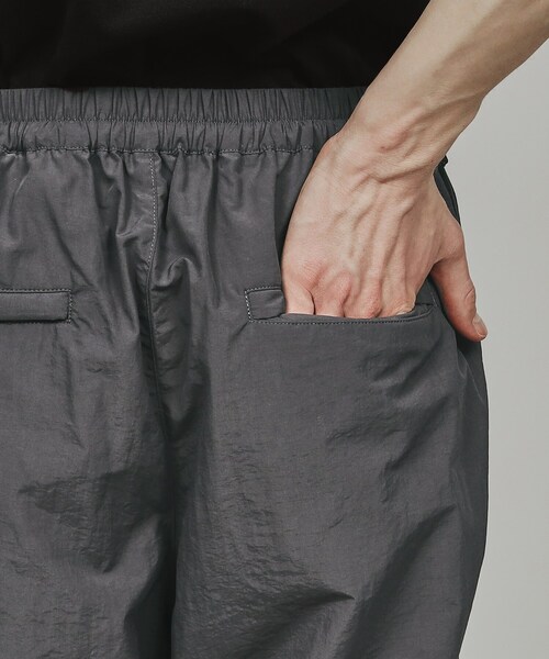 tk.TAKEO KIKUCHI（ティーケータケオキクチ）の「◆サイドオープンナイロンパンツ（その他パンツ・メンズ・ブラック/チャコールグレー・03/02）」の11枚目の写真