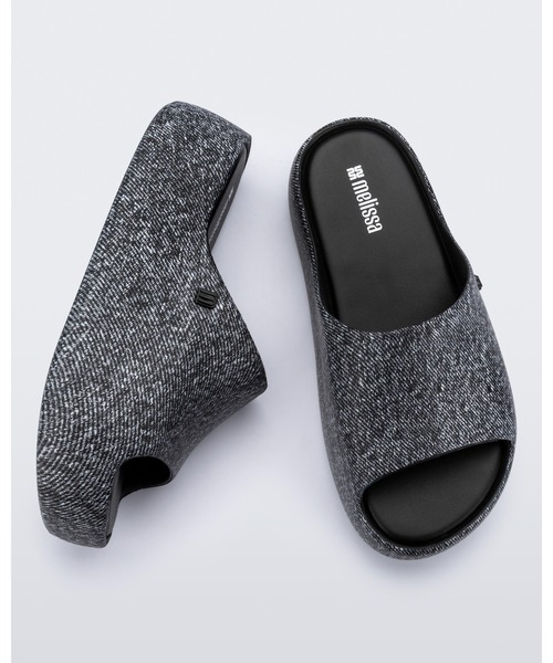 melissa(メリッサ)の「MELISSA FREE PLATFORM SLIDE DENIM AD(サンダル・レディース・ブラック/ブルー・35-36/38/37/39)」の1枚目の写真