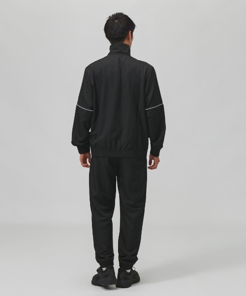 PUMA（プーマ）の「プーマ PUMA ウーブン カラーブロック スーツ（ジャージ・メンズ・ネイビー/ブラック・LL/L/3L/S/M）」の4枚目の写真