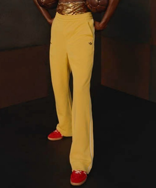 WALES BONNER(ウェールズ ボナー)の「WB TRACK PANTS(スウェットパンツ・メンズ・ゴールド・L/S/XL/M)」の2枚目の写真